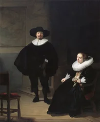 Eine Dame und ein Herr in Schwarz